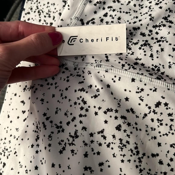 CheriFit leggings. Size Medium. White with tiny black , grey stars. - Picture 2 of 3